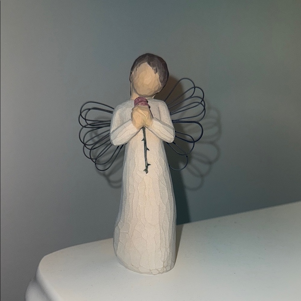 Willow Tree sculpture with rose
